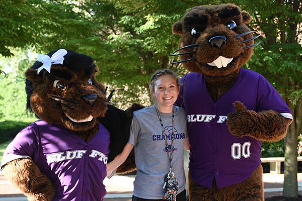Caitlyn Renner with Bluffton's mascots, J. Denny and Jenny Beaver